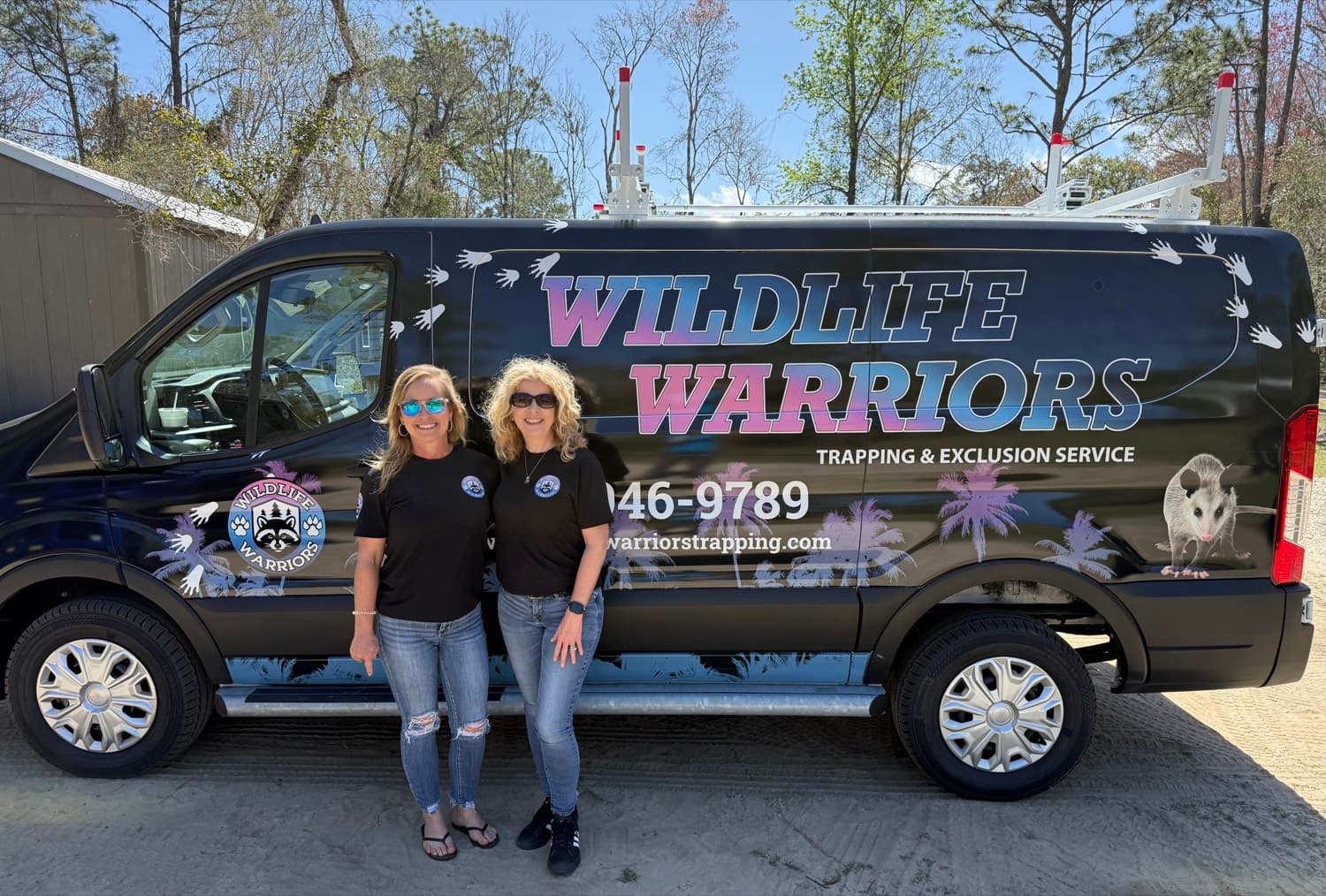 The Wildlife Warriors team beside their custom-built service van